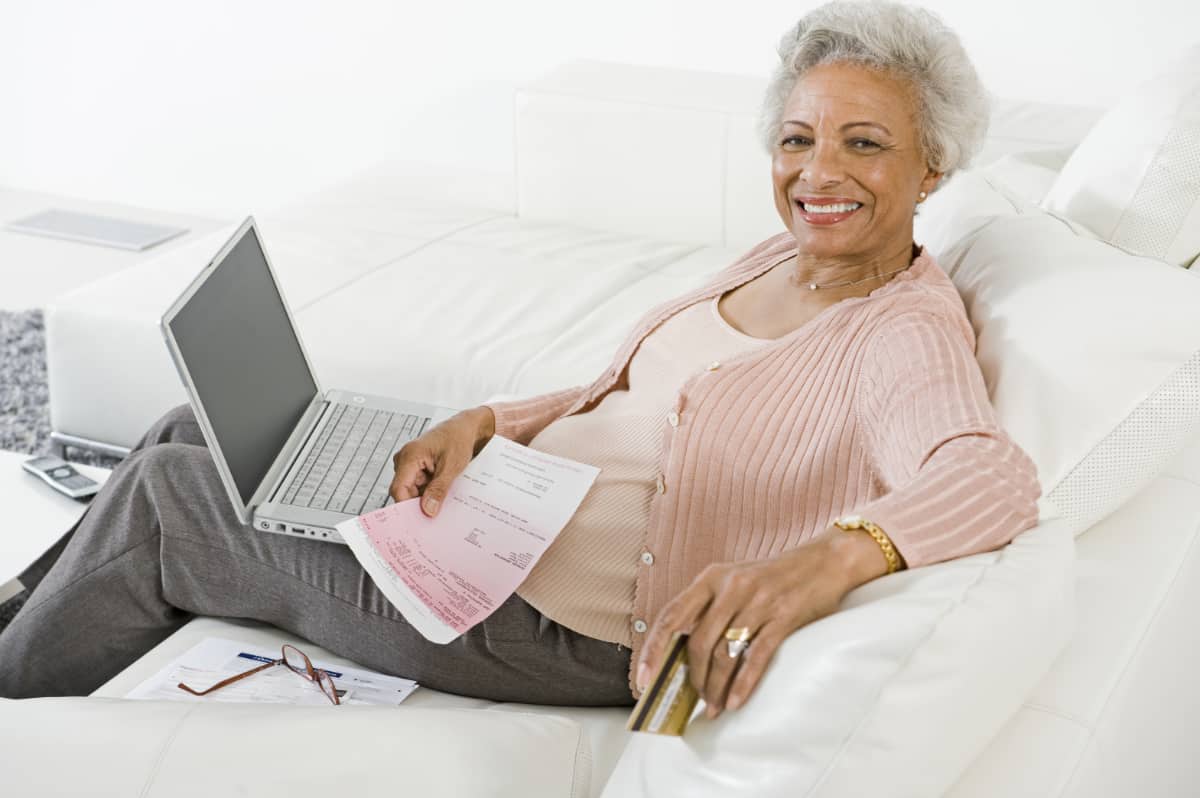 Senior Woman Paying Bills Online