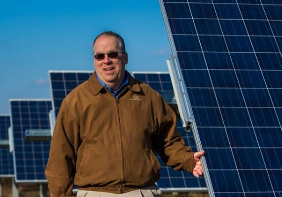 CEC CEO, , Mark Walling, at solar farm.
